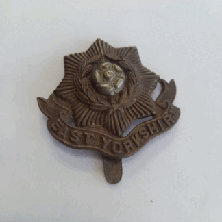 Genuine WW1 East Yorkshire cap badge with slider