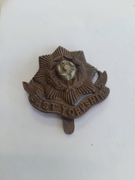Genuine WW1 East Yorkshire cap badge with slider Genuine WW1 East Yorkshire cap badge with slider