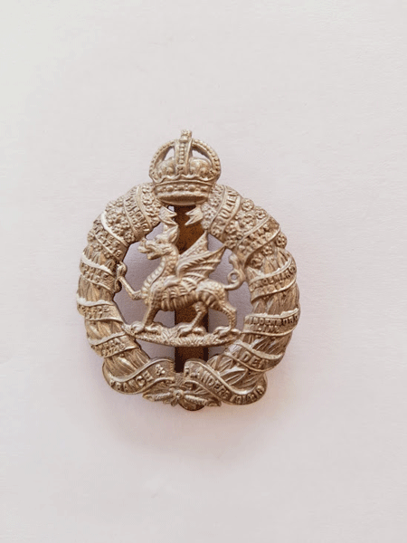 Monmouthshire Regiment Cap badge white metal on slider Monmouthshire Regiment Cap badge white metal on slider